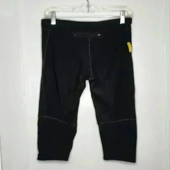 Size Medium Nike Dri-Fit Livestrong Capri's Black / Yellow Logo - Picture 2 of 6